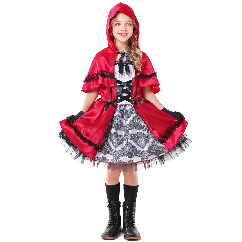 Girls red satin hooded cape costume with lace-up bodice, damask print panel and black tulle hem - view 2