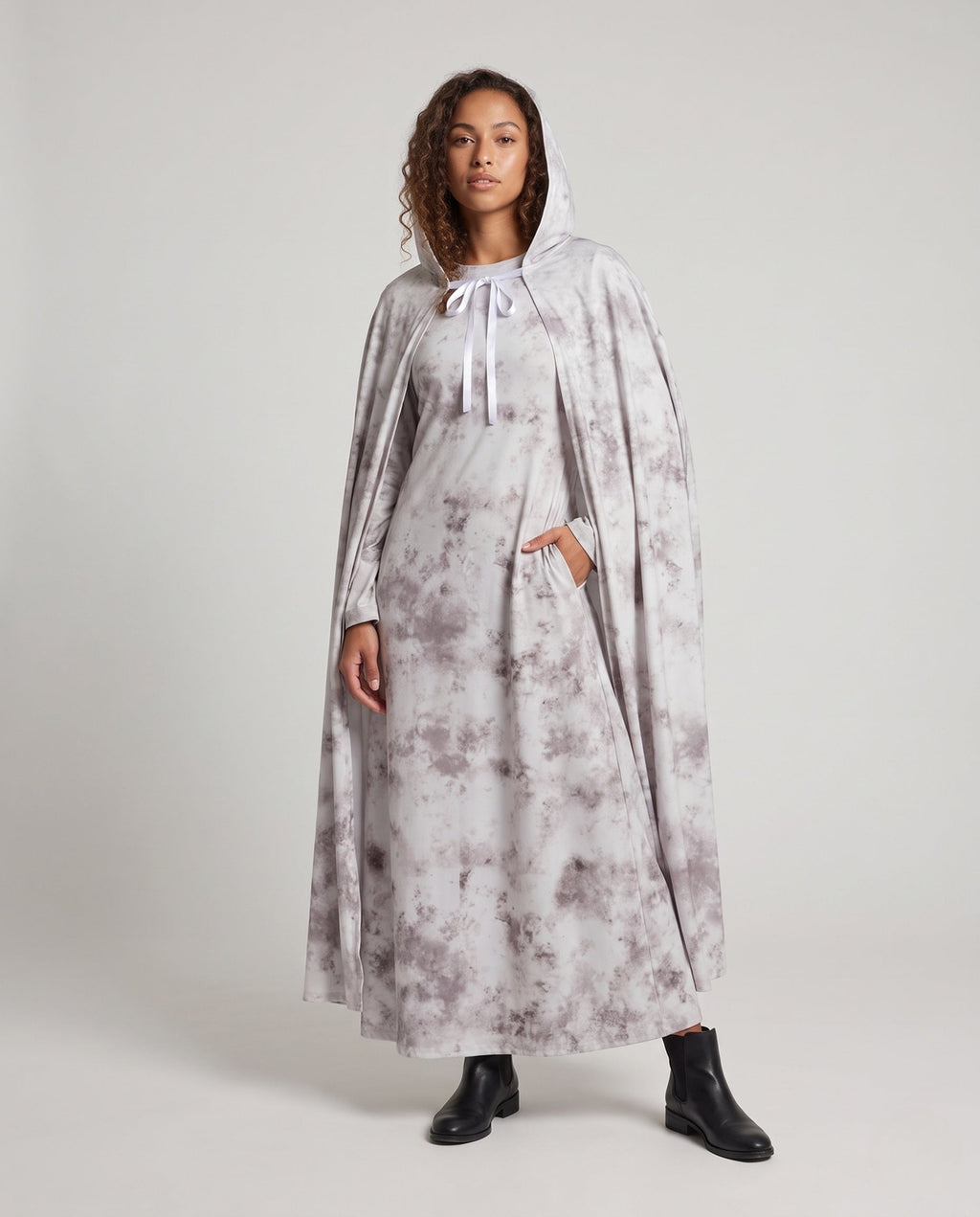 Women's gray tie-dye hooded ghost cape with white ribbon tie over a matching long-sleeve maxi dress