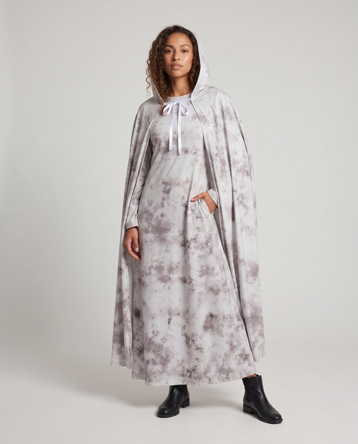 Women's gray tie-dye hooded ghost cape with white ribbon tie over a matching long-sleeve maxi dress