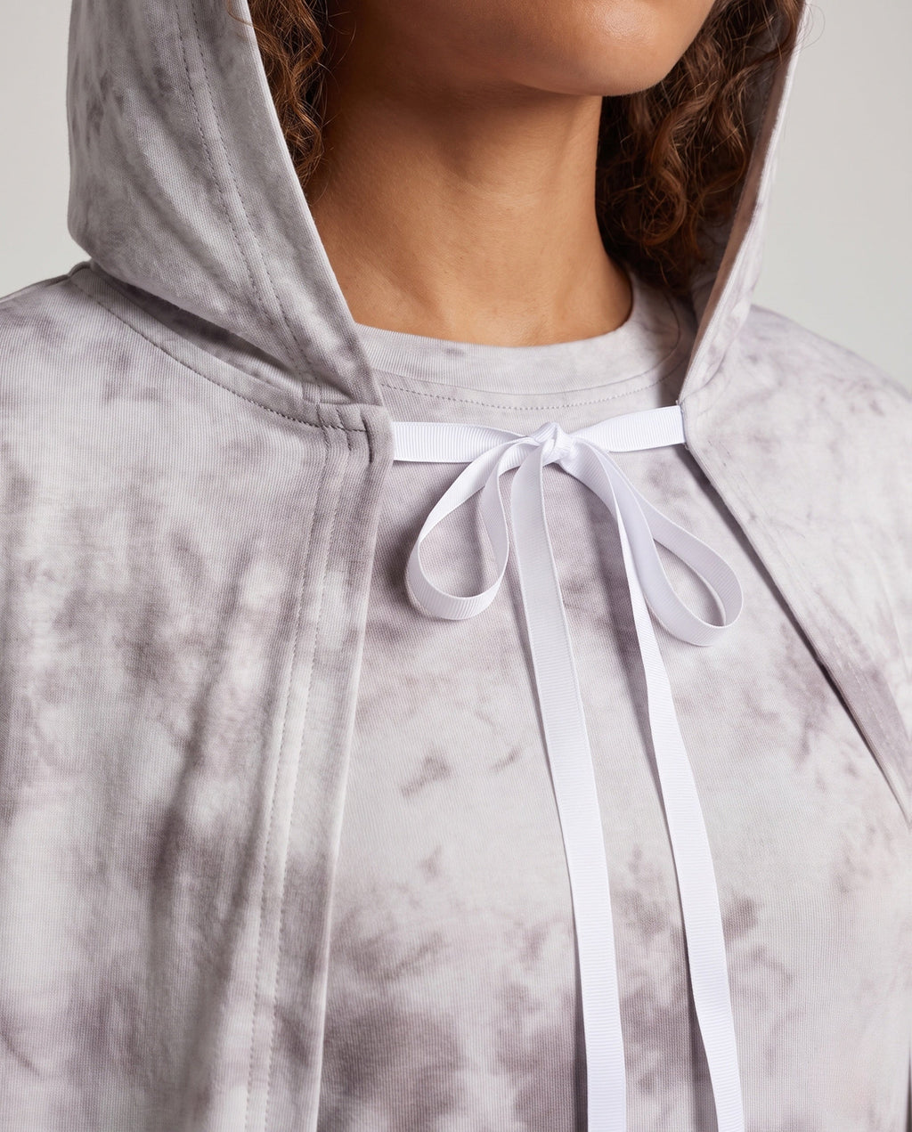 Women's gray tie-dye hooded ghost cape with white ribbon tie over a matching long-sleeve maxi dress - view 3
