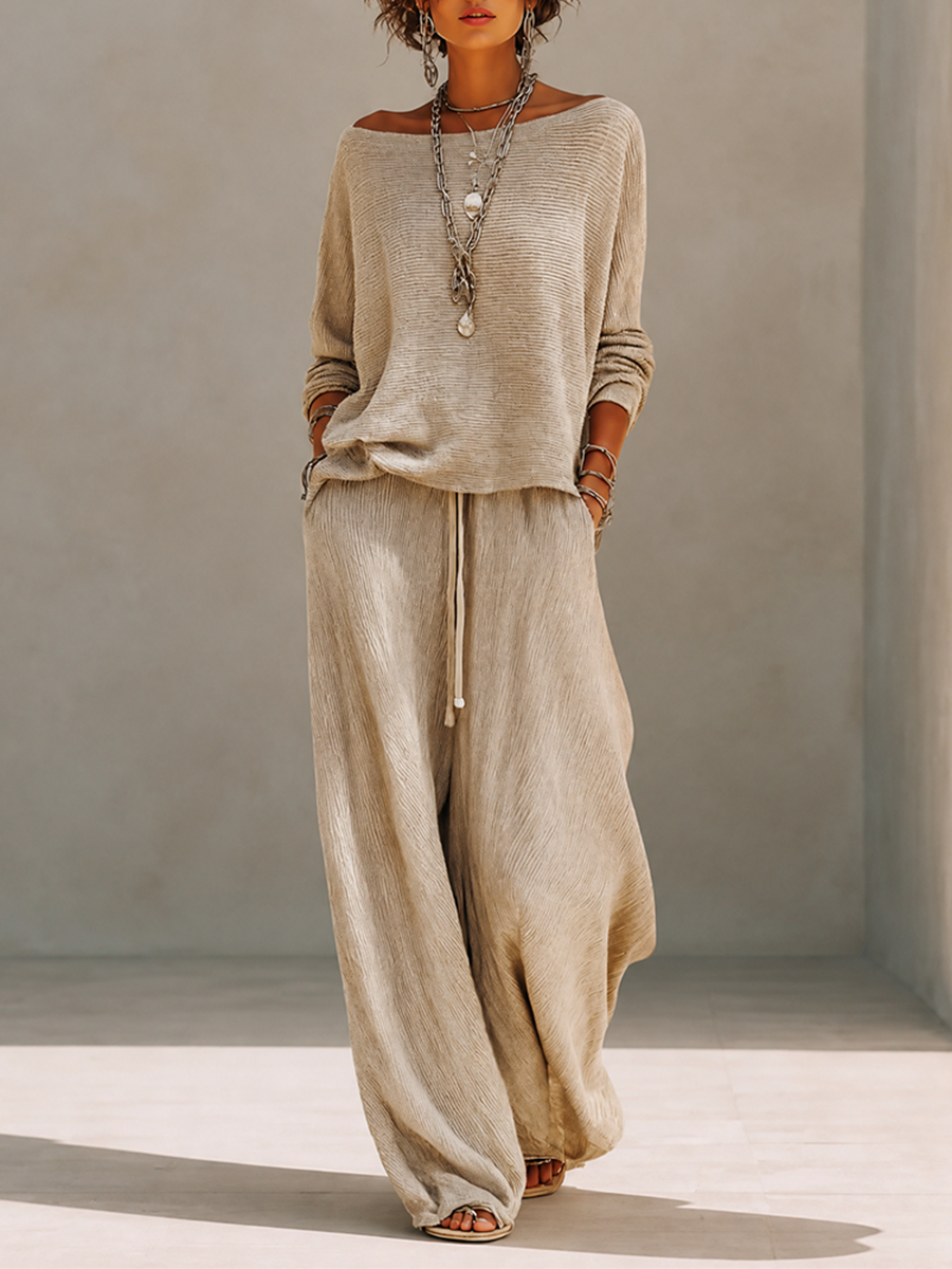 Khaki textured knit pullover and crinkle wide leg pants set on a model