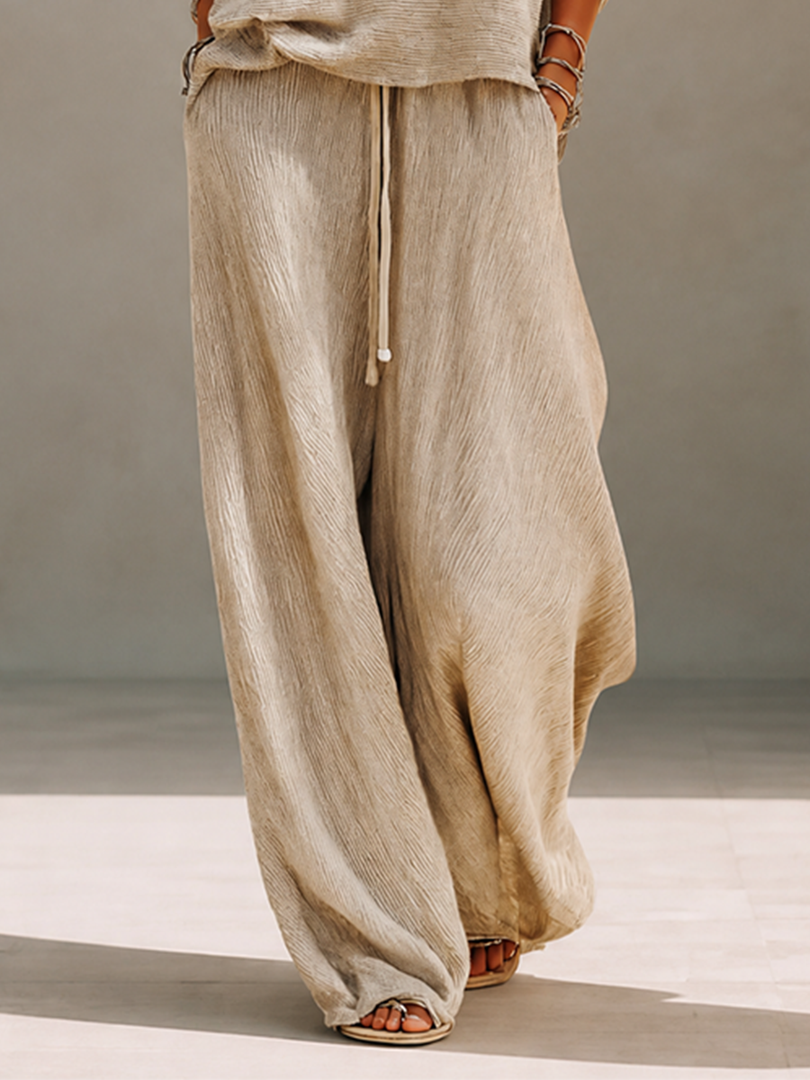 Khaki textured knit pullover and crinkle wide leg pants set on a model - view 7
