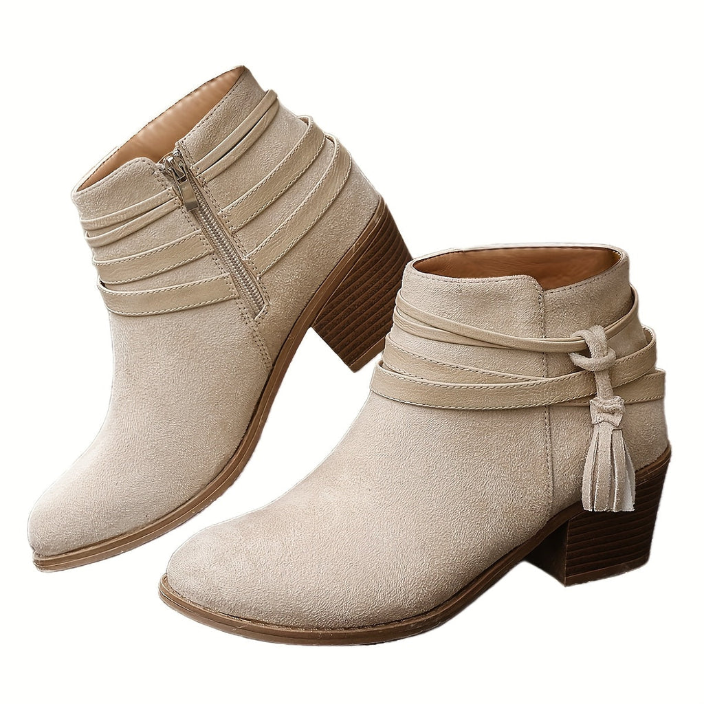 Amelie tassel ankle boots in cream beige suede, pair on a plain white background