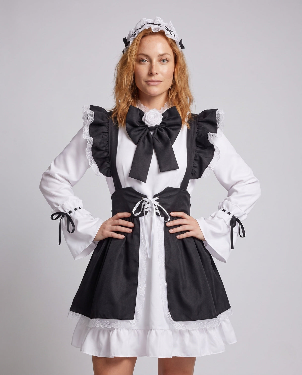 Women's black and white maid Halloween costume with ruffled apron, laced waist and large bow - view 2