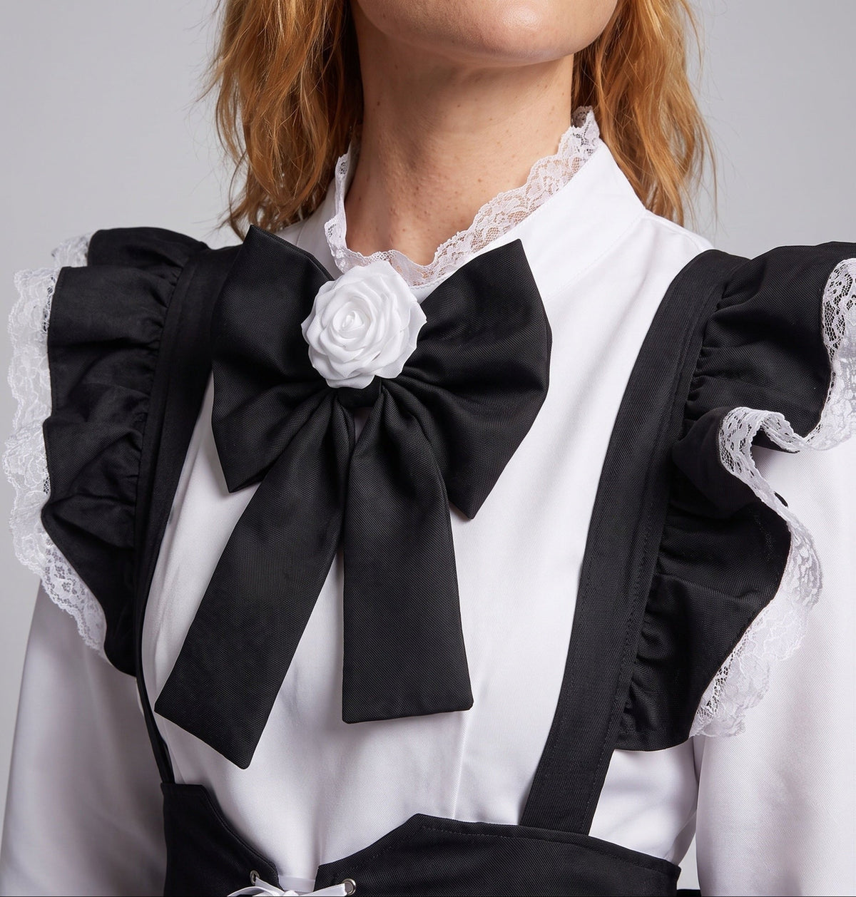 Women's black and white maid Halloween costume with ruffled apron, laced waist and large bow - view 3
