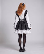 Women's black and white maid Halloween costume with ruffled apron, laced waist and large bow - view 4