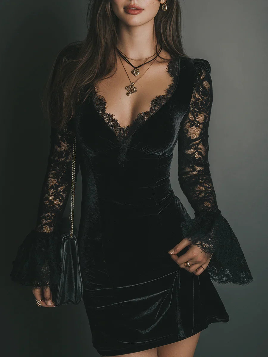 Black velvet long sleeve mini dress with sheer lace sleeves, flared cuffs and lace-trimmed V-neck
