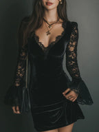 Black velvet long sleeve mini dress with sheer lace sleeves, flared cuffs and lace-trimmed V-neck