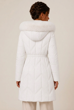 Quilted knee-length puffer jacket for women with faux fur hood and cinched waist - view 12