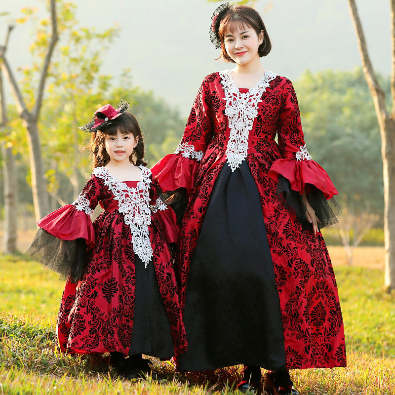 Girls red and black damask ball gown Halloween costume with white lace bodice and tulle bell sleeves