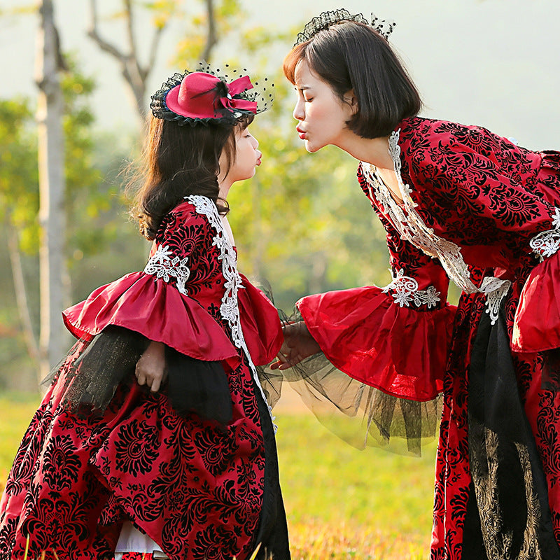 Girls red and black damask ball gown Halloween costume with white lace bodice and tulle bell sleeves - view 2