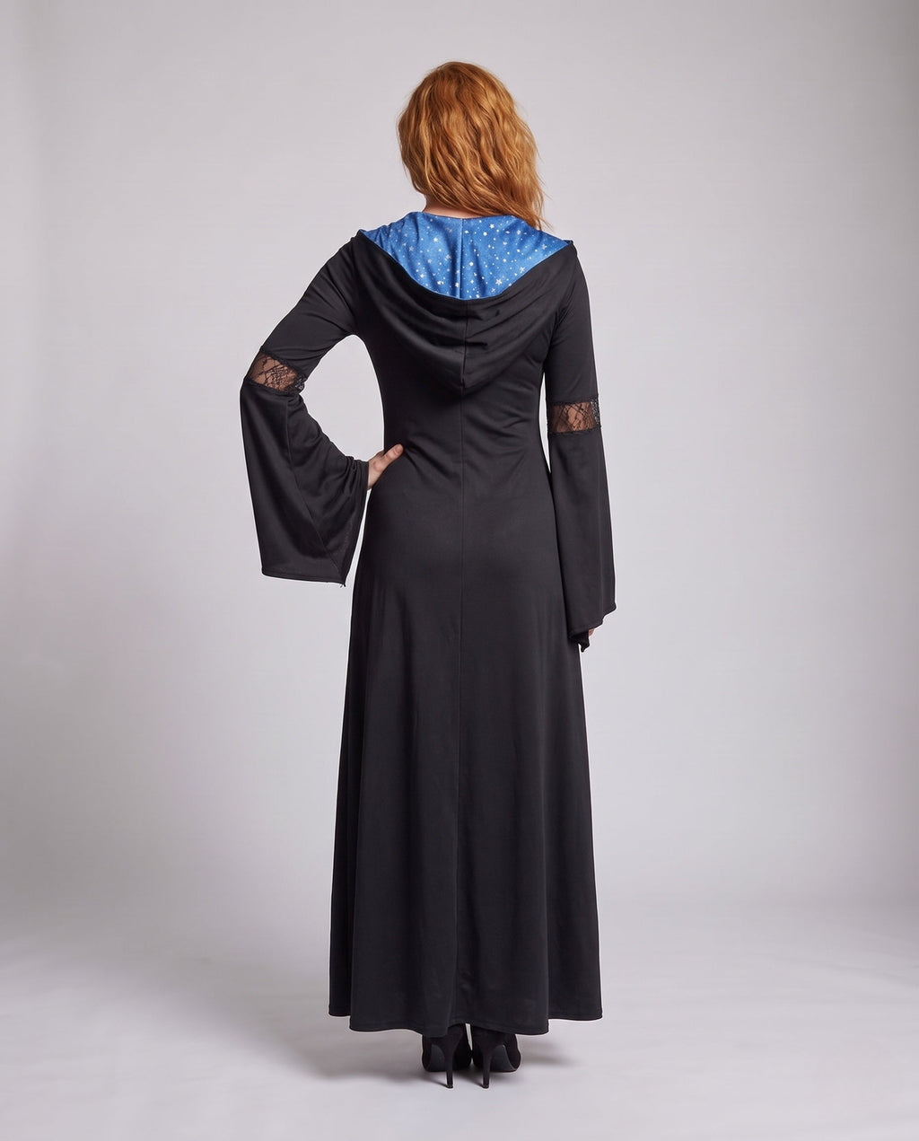 Women's hooded witch costume dress in black with blue star-print panel, lace-up front and bell sleeves - view 3