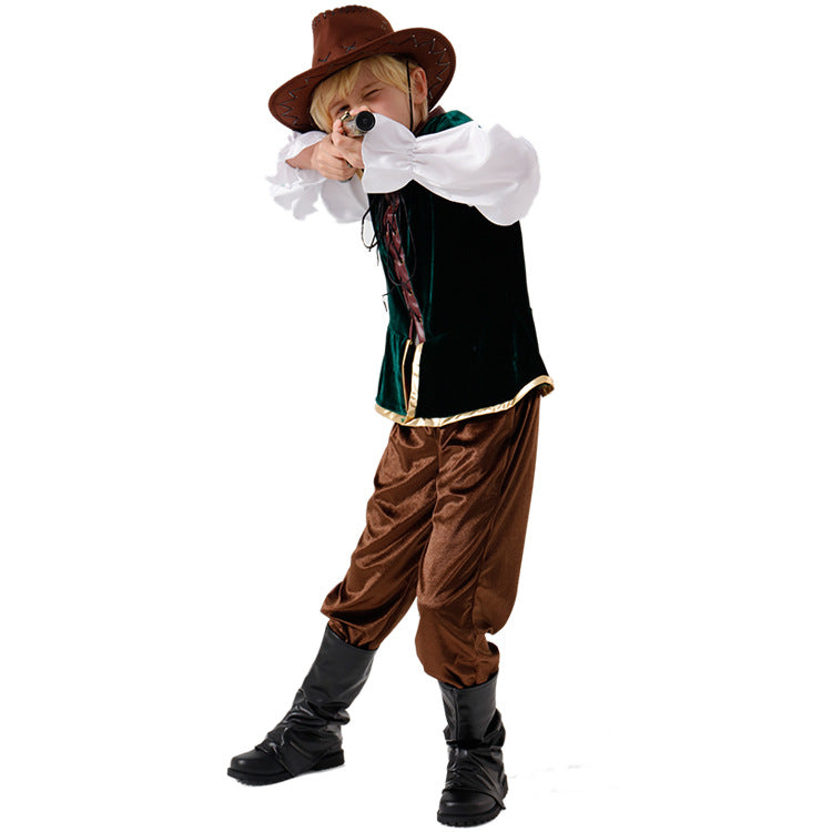 Boy wearing a cowboy Halloween costume with green velvet vest, white ruffle-sleeve shirt, brown pants and brown cowboy hat