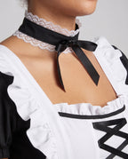 Women's black and white maid Halloween costume with ruffled white apron and puff sleeves - view 2