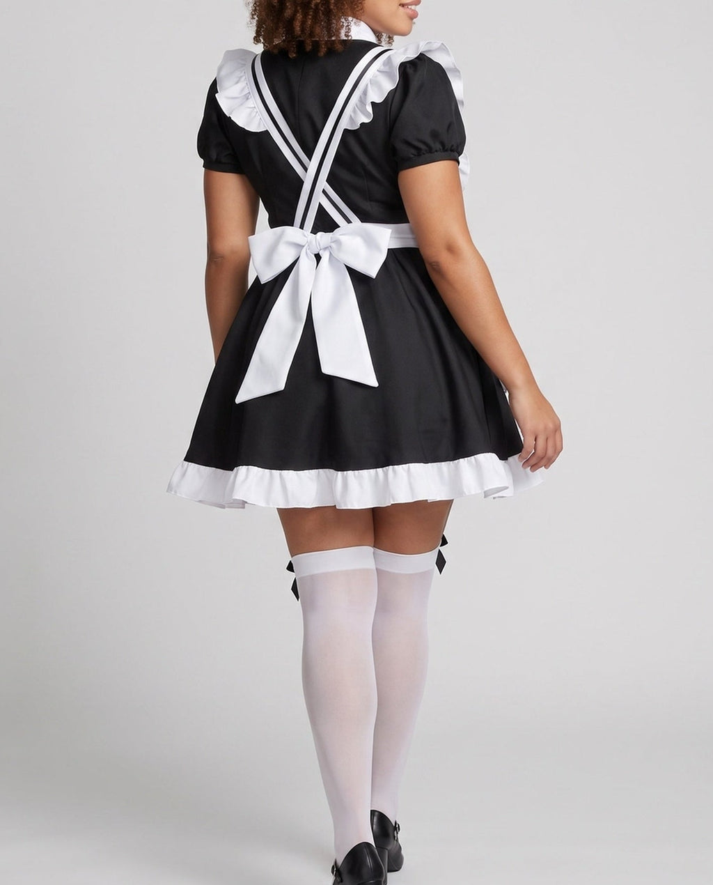 Women's black and white maid Halloween costume with ruffled white apron and puff sleeves - view 3
