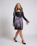 Women's scary nun Halloween costume with black long sleeve dress and jagged purple-gray print skirt