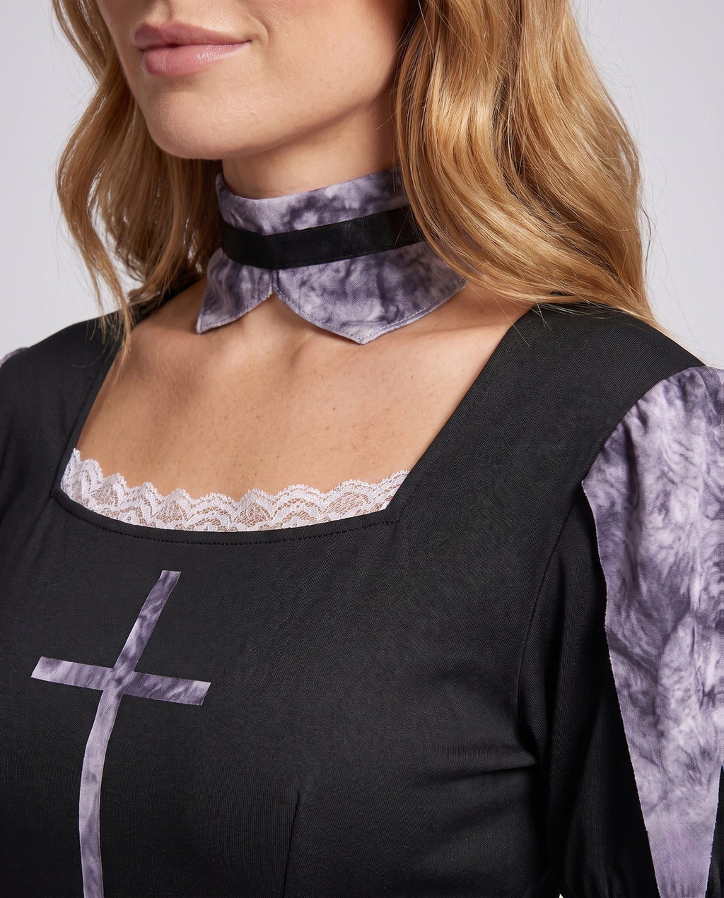 Women's scary nun Halloween costume with black long sleeve dress and jagged purple-gray print skirt - view 3