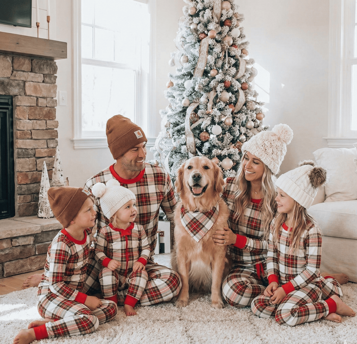 Red and white plaid matching family Christmas pajamas with red crew neck and cuffs