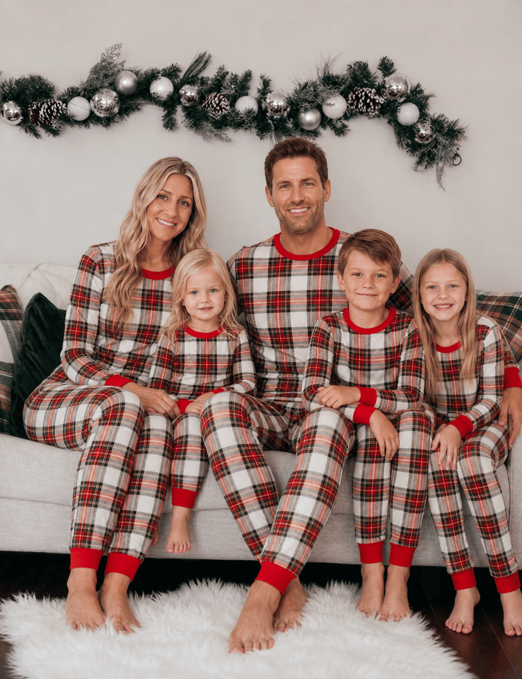 Red and white plaid matching family Christmas pajamas with red crew neck and cuffs - view 6
