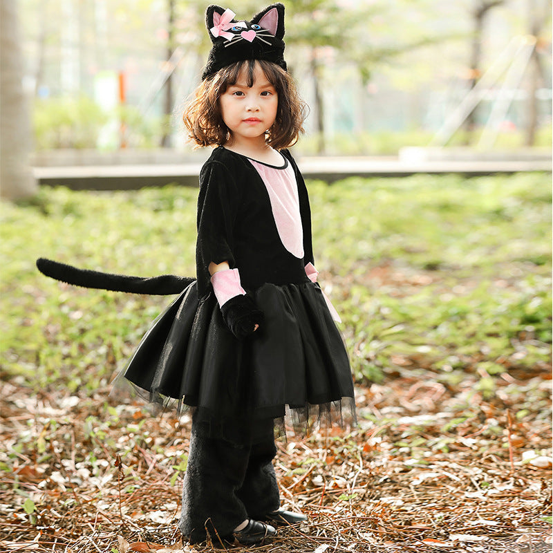 Girl wearing a black and pink cat costume with tulle skirt and cat-ear hat - view 3