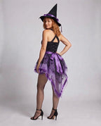 Women's purple and black witch Halloween costume with ribbon-laced bodice, spiderweb tulle high-low skirt and pointed witch hat - view 3