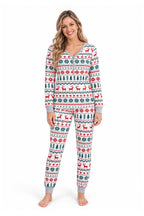 Family wearing matching Fair Isle Christmas pajamas with reindeer print and gray ribbed cuffs - view 11