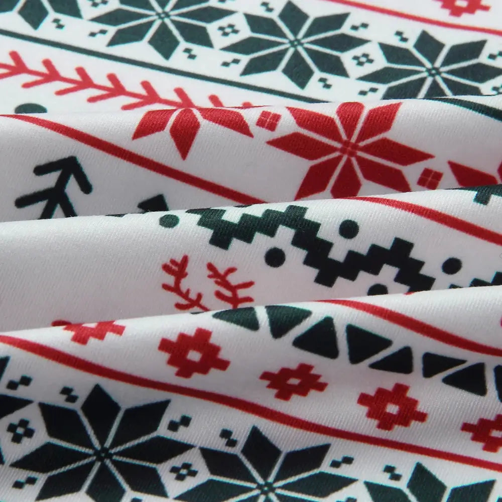 Family wearing matching Fair Isle Christmas pajamas with reindeer print and gray ribbed cuffs - view 16