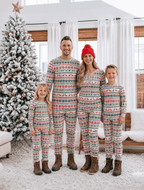Family wearing matching Fair Isle Christmas pajamas with reindeer print and gray ribbed cuffs - view 8