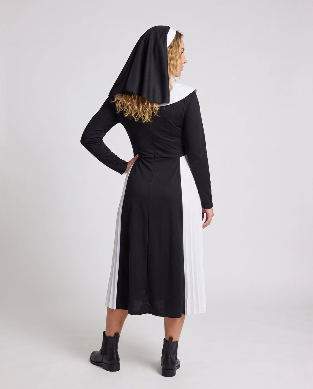 Women's nun Halloween costume, black long-sleeve midi dress with white pleated panels, bib collar, hood and cross necklace - view 3