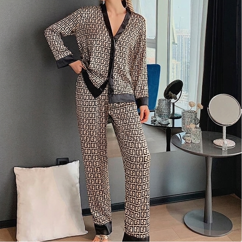 Women's geometric print satin pajama set with black contrast trim, V-neck button top and long sleeves - view 2