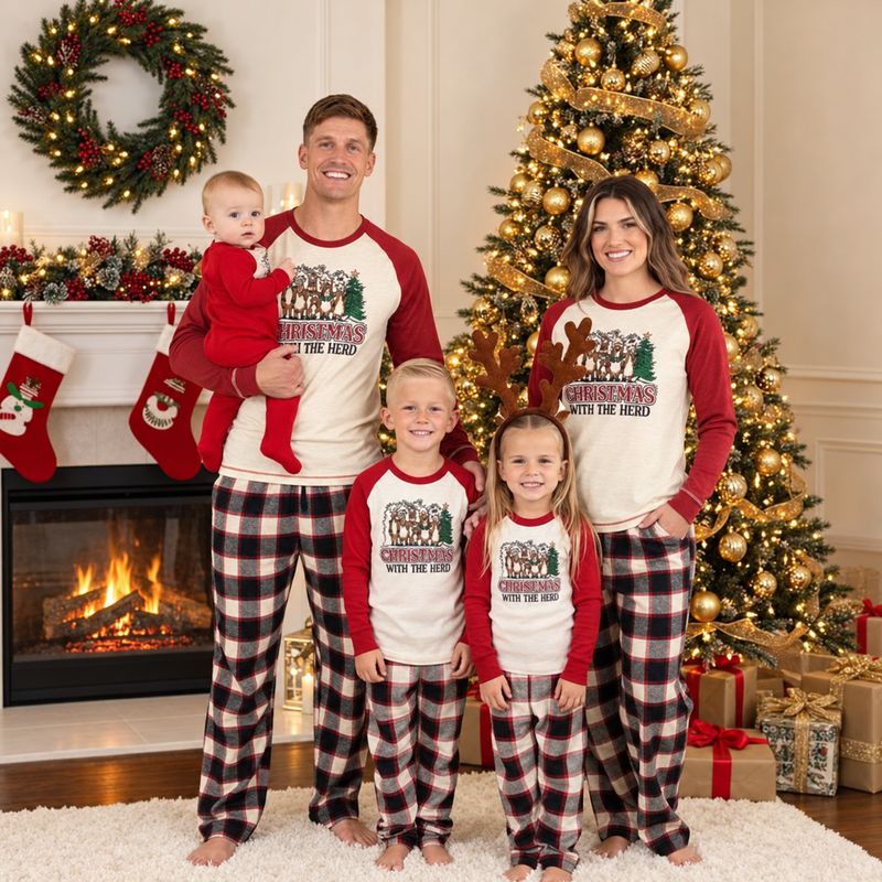 Matching Christmas pajamas with cream and red reindeer tee and plaid pants