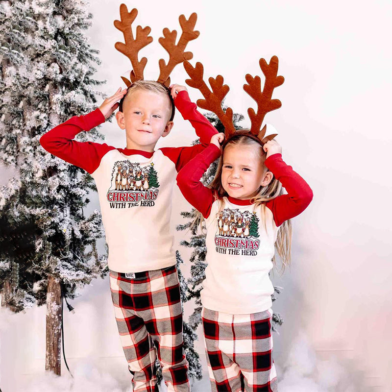 Matching Christmas pajamas with cream and red reindeer tee and plaid pants - view 7