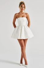 Strapless pink floral jacquard homecoming mini dress with oversized back bow and lace-up corset back - view 13