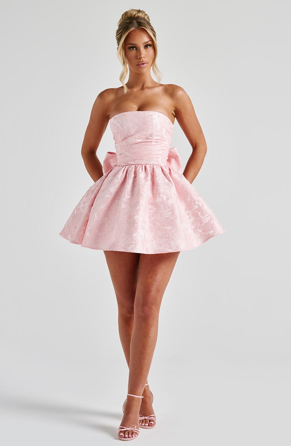 Strapless pink floral jacquard homecoming mini dress with oversized back bow and lace-up corset back - view 2