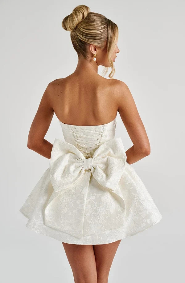 Strapless pink floral jacquard homecoming mini dress with oversized back bow and lace-up corset back - view 9