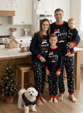 Matching family Christmas pajamas in navy with a Merry Christmas Santa hat top and holiday print pants