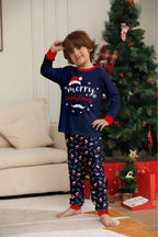 Matching family Christmas pajamas in navy with a Merry Christmas Santa hat top and holiday print pants - view 10