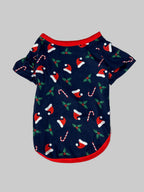 Matching family Christmas pajamas in navy with a Merry Christmas Santa hat top and holiday print pants - view 4