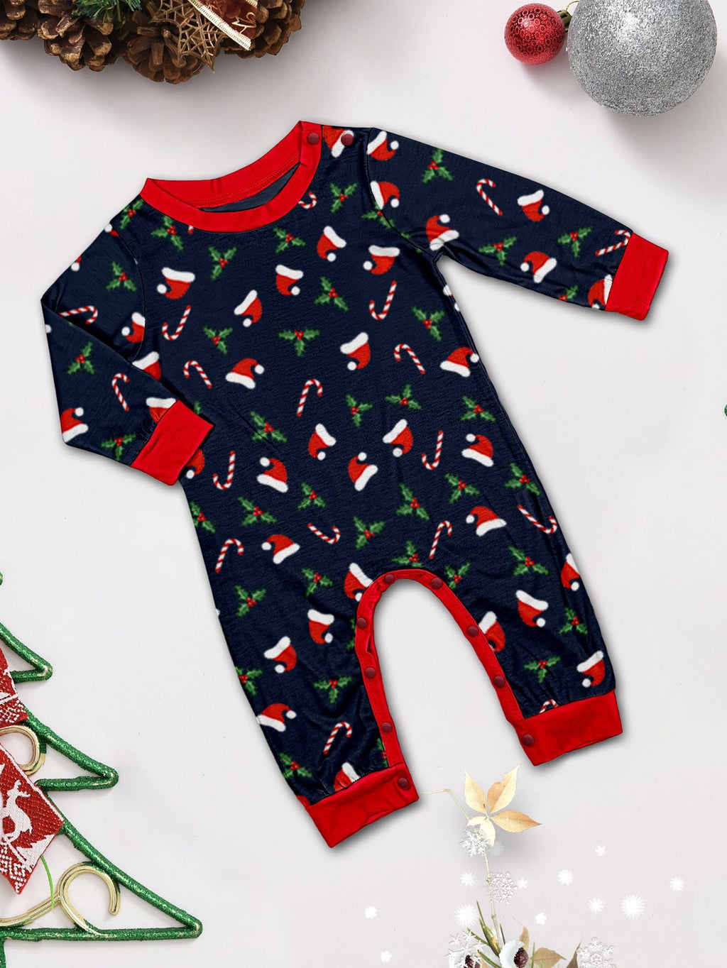 Matching family Christmas pajamas in navy with a Merry Christmas Santa hat top and holiday print pants - view 5