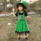 Girl wearing a green velvet leprechaun costume dress with lace-up front, black puff sleeves, fringed hem and tall buckled hat - view 4