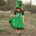 Girl wearing a green velvet leprechaun costume dress with lace-up front, black puff sleeves, fringed hem and tall buckled hat - view 6