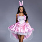 Woman wearing pink satin bunny costume with halter neck, white bib, ruffled tulle high-low skirt and bunny ears headband