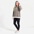 Woman wearing an oversized quarter zip sweatshirt in dark brown leopard print ribbed knit with black leggings - view 8