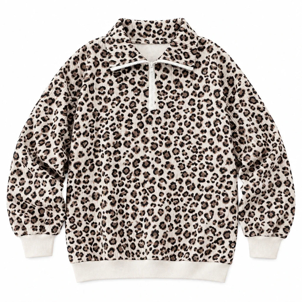Woman wearing an oversized quarter zip sweatshirt in dark brown leopard print ribbed knit with black leggings - view 9