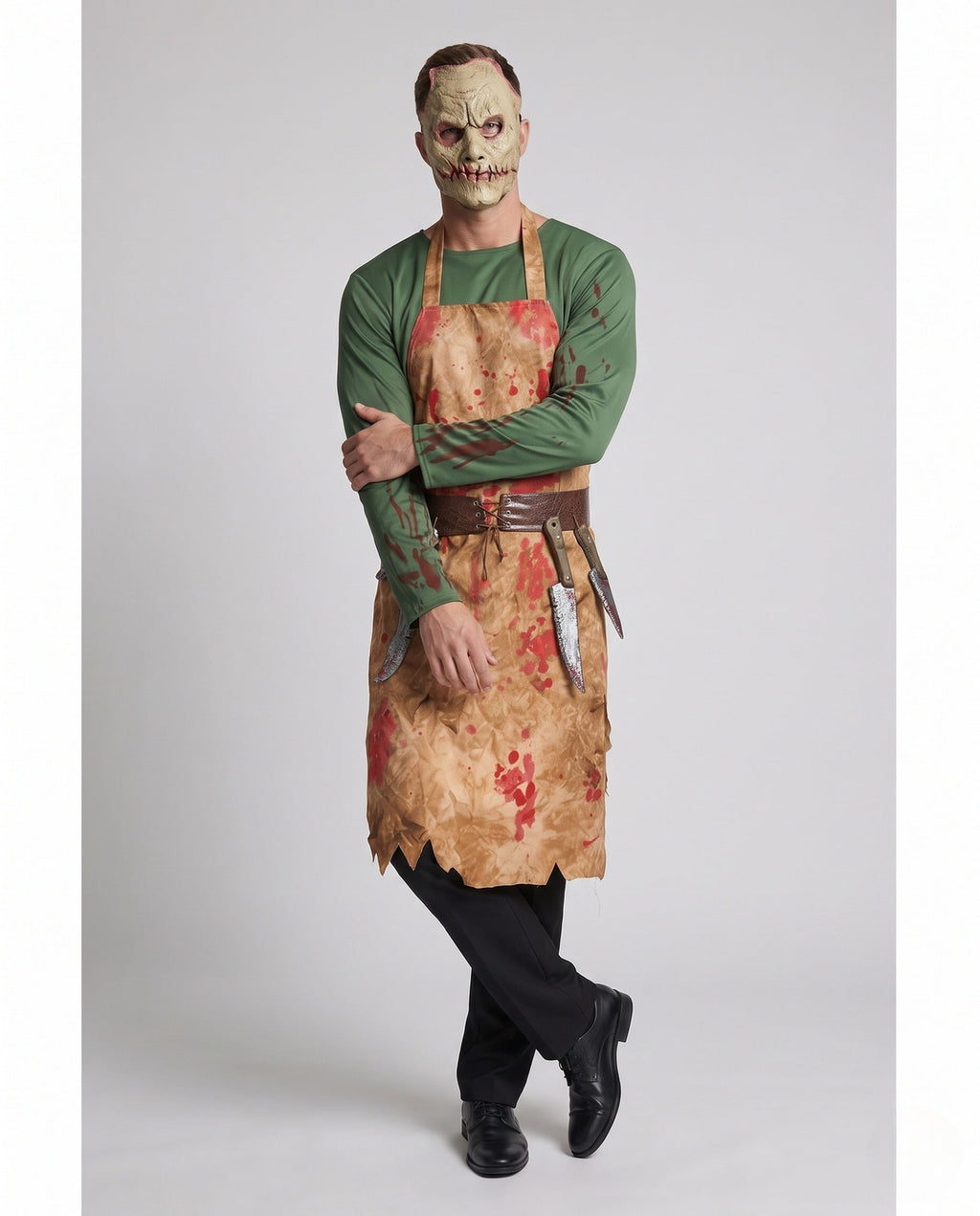 Men's butcher Halloween costume with blood-splatter print apron, green top and stitched-face mask