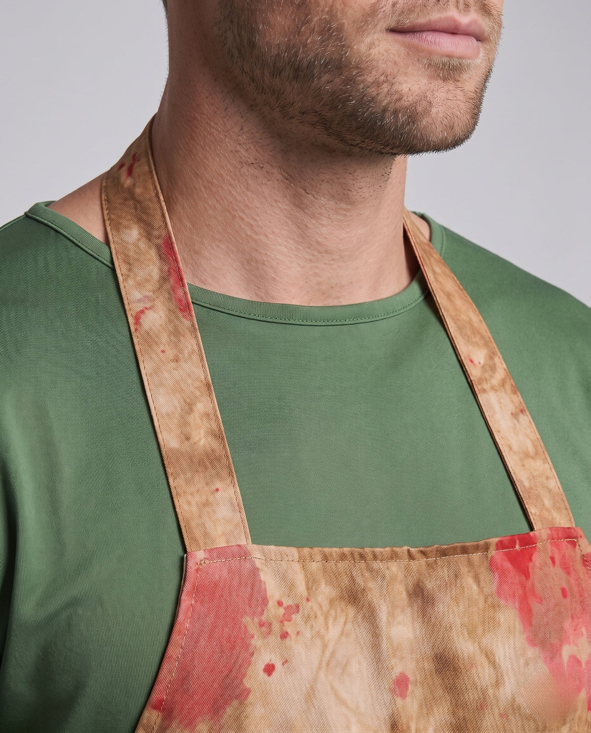 Men's butcher Halloween costume with blood-splatter print apron, green top and stitched-face mask - view 2
