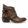 Studded buckle ankle boots in distressed leather with chain detail and a low block heel