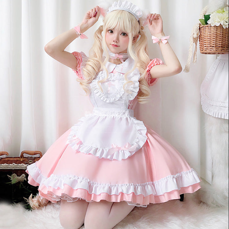 Pink and white ruffled maid-style costume dress with apron and cat ears
