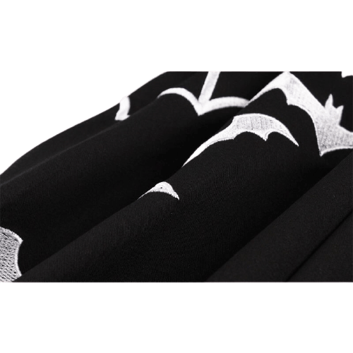 Black swing dress with white bat-shaped collar and embroidered bats on the skirt - view 2
