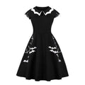 Black swing dress with white bat-shaped collar and embroidered bats on the skirt - view 3